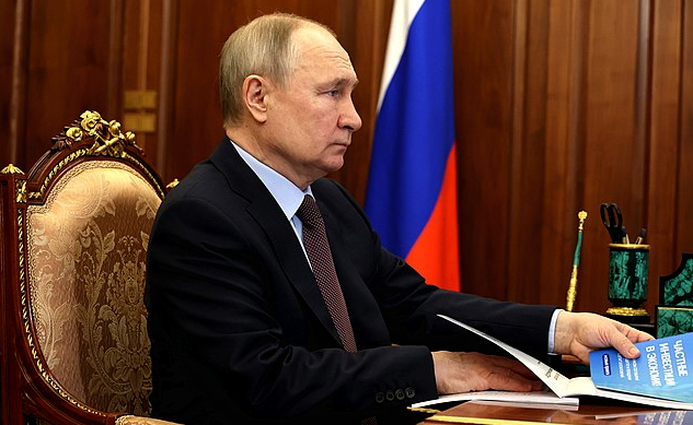 Putin Shows 'Signed Peace Agreement' with Ukraine