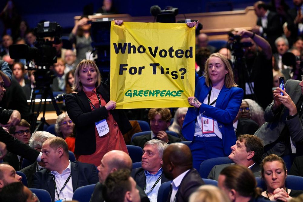 UK: Liz Truss Speech Disrupted by Greenpeace Protestors post image