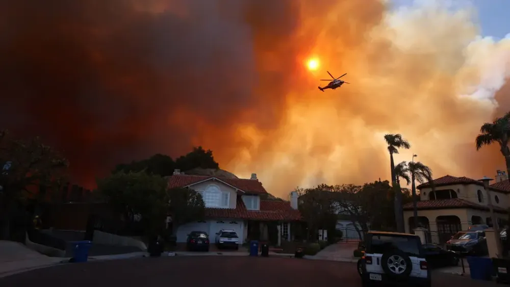 Los Angeles: Wildfires Kill at Least 2, Over 80K Evacuated post image